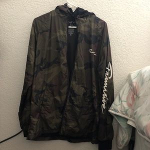 Primitive skateboarding wind breaker with hood